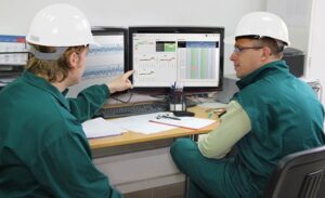 Quality Assurance team looking at charts
