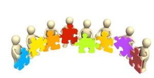 Artwork of people forming a semicircle holding a puzzle piece