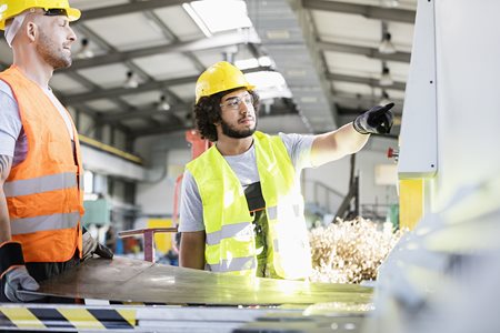 worker explaining things that need improvement 