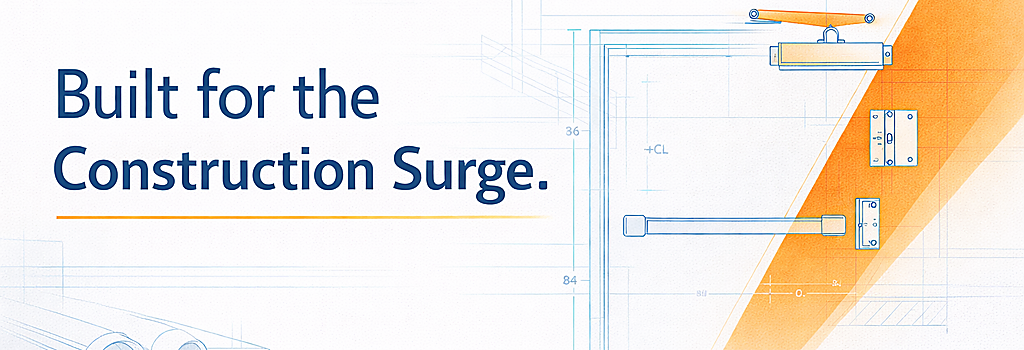 Architectural openings distributor reviewing door and hardware plans during peak construction season